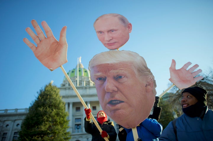 Donald Trump protestors demonstrate outside the Pennsylvania Capitol Building before electors arrive to cast their votes from the election at December 19, 2016 in Harrisburg, Pennsylvania.