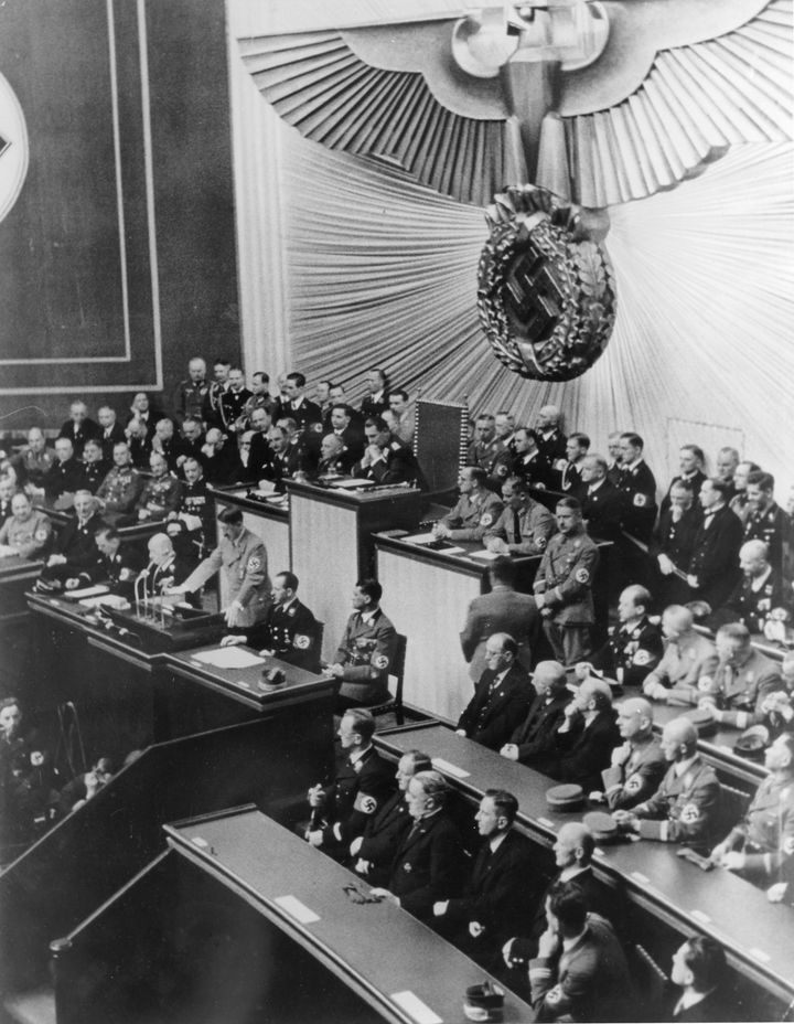 Hitler addresses the Reichstag in Berlin in 1938. Anton Reinthaller is in the first row, fifth from left, according to a caption provided by Getty.