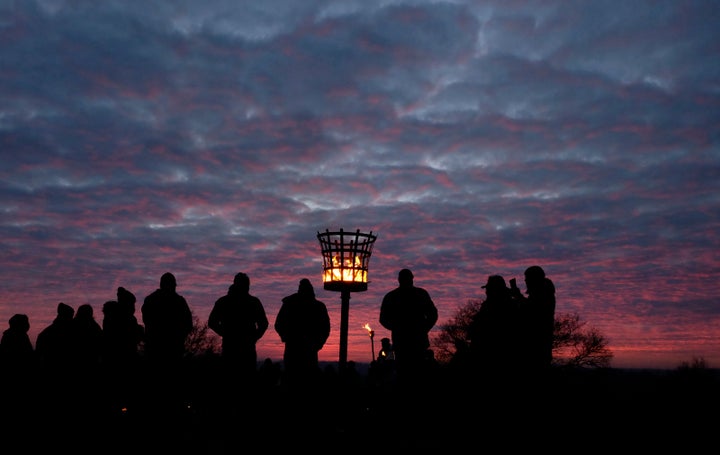 The Charnwood Grove of Druids gather for a public winter solstice ritual on Beacon Hill near Loughborough, Britain December 18, 2016.