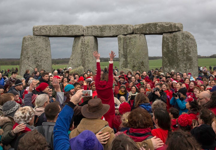 Revelers celebrate the winter solstice at Stonehenge on December 22, 2015. Stonehenge is a celebrated venue of festivities during the winter solstice - the shortest day of the year in the northern hemisphere - and it attracts thousands of revelers, spiritualists and tourists. Druids, a pagan religious order dating back to Celtic Britain, believe Stonehenge was a center of spiritualism more than 2,000 years ago.