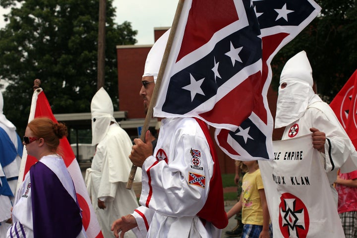 Members of the Fraternal White Knights of the Ku Klux Klan are seen marching in Pulaski, Tennessee, in 2009. Lyons admits to assisting and defending a KKK parade in 1989.