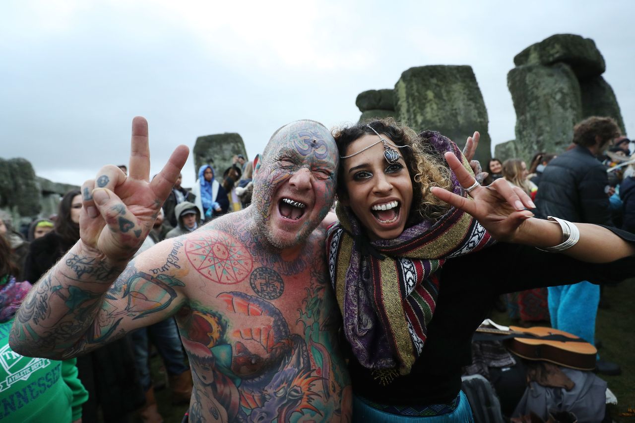 Druids, pagans and other revellers gather to watch the sunrise 