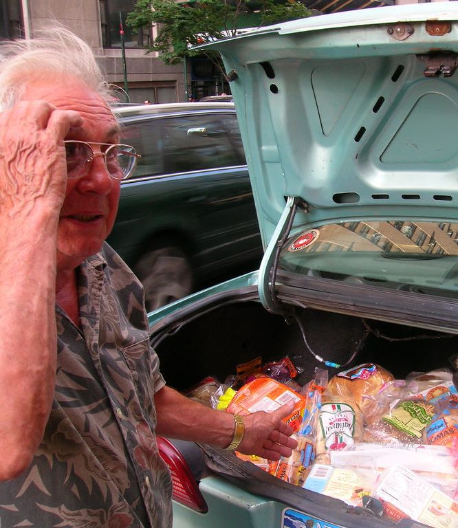 My dad, Pete Toscano, with a trunk of bread to give to the needy and friends. 