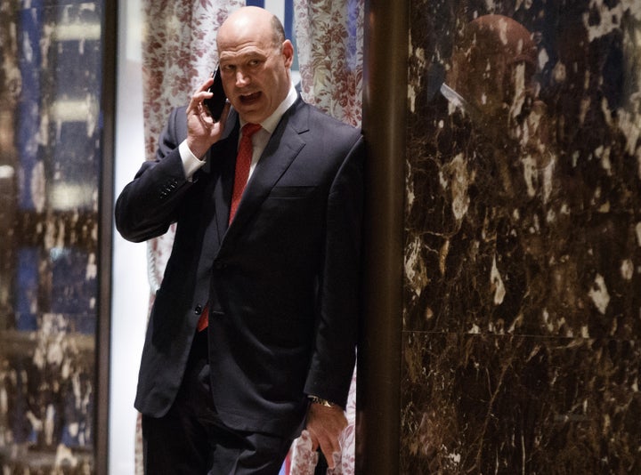 Former Goldman Sachs Chief Operating Officer Gary Cohn talks on the phone as he waits to have a meeting with Presid