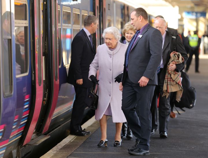 Queen Elizabeth II walks along the platform at King's Lynn railway station in Norfolk, as she returns to London after spending the Christmas period at Sandringham House last year