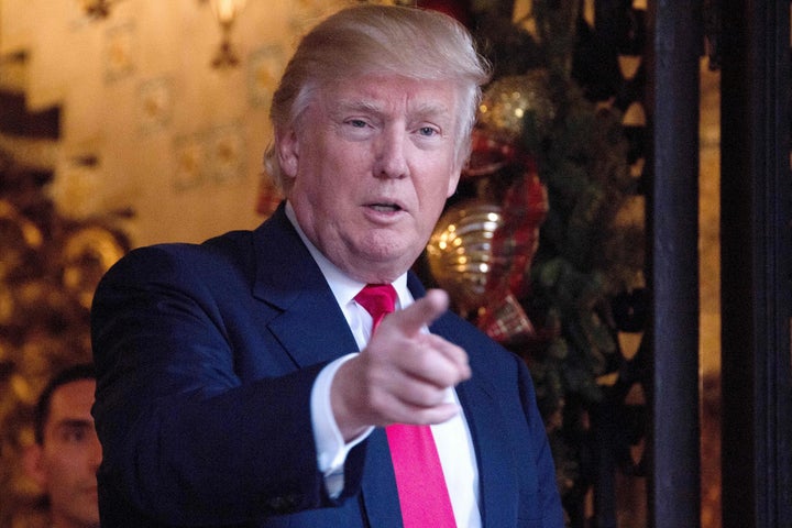 US President-elect Donald Trump speaks to reporters at Mar-a-Lago in Palm Beach yesterday