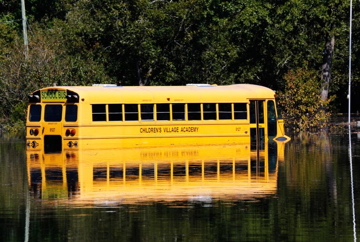 A school bus is partially submerged as the Neuse River floods following Hurricane Matthew in Kinston, North Carolina, Oct. 12, 2016.