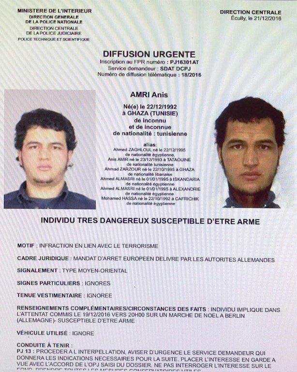 This handout computer screen grab shows a copy of the arrest warrant over a Tunisian man identified as Anis Amri.