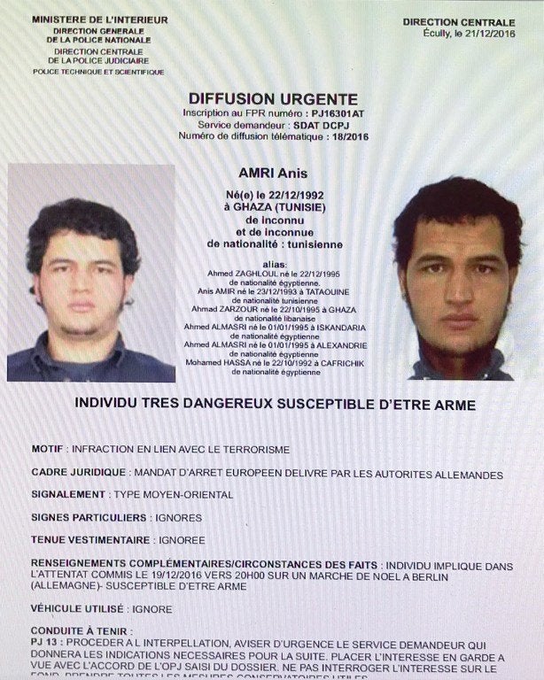 <strong>This handout computer screen grab shows a copy of the arrest warrant over a Tunisian man identified as Anis Amri.</strong>