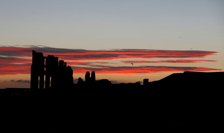 <strong>Tynemouth Priory on the North East coast before sunrise, as Britain braced itself for the arrival of Storm Barbara, which is set to batter the country with strong winds.</strong>