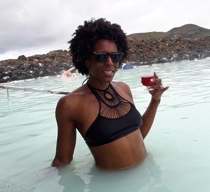 Enjoying a drink in the Blue Lagoon. Visitors can swim up to the bar to order smoothies and wine.