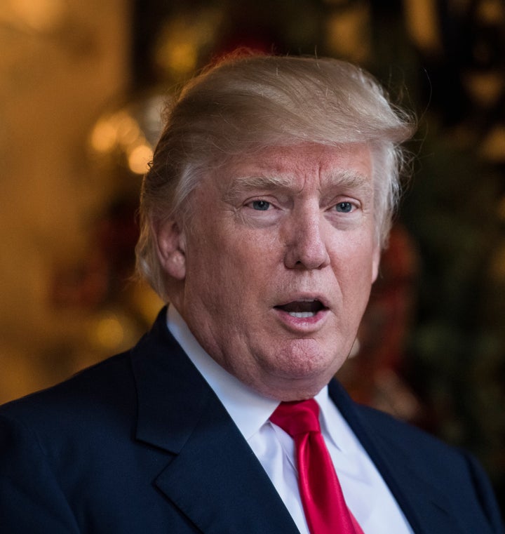 President-Elect Donald Trump talks to the media at the Mar-a-Lago club in Palm Beach, Florida -- which has also used foreign workers.