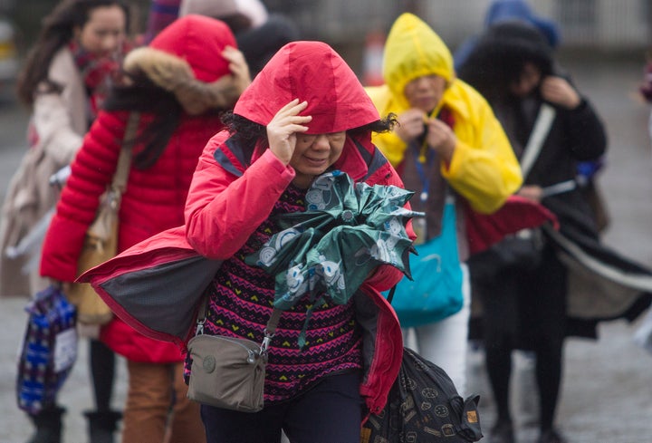 <strong>Visitors to Edinburgh's old city braved the gale force winds on Friday</strong>