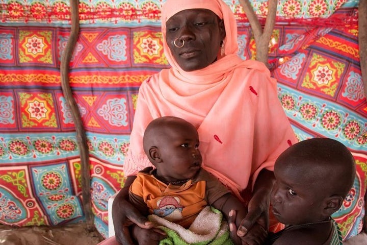 Haje Fanta, 28, from Niger, is caring for two of her children at the refugee camp.