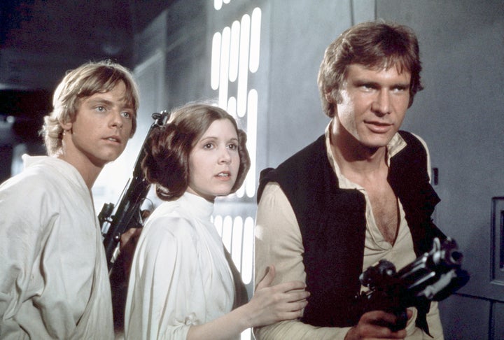 Fisher, center, on the set of "Star Wars: A New Hope."