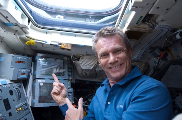 Sellers is seen on the aft flight deck of the Earth-orbiting space shuttle Atlantis during Flight Day 2 activities in this photo provided by NASA and taken May 15, 2010.