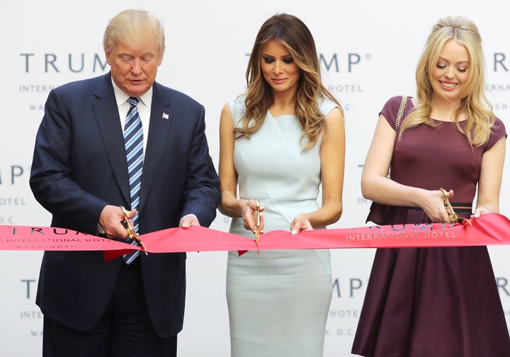 President-elect Donald Trump, Melania Trump and his daughter Tiffany Trump cut the ribbon at the new Trump International Hotel in Washington, DC, on Oct. 26.