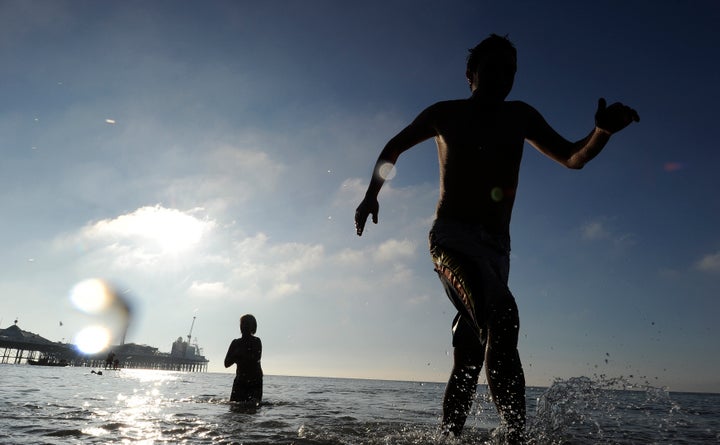 Normally a few dozen swimmers take part with thousands of spectators attending 