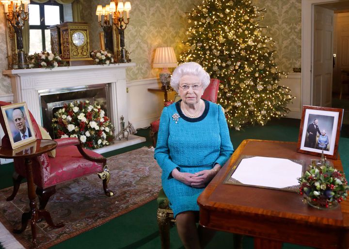 <strong>Queen Elizabeth II sits at a desk in the Regency Room in Buckingham Palace, London, after recording her Christmas Day broadcast to the Commonwealth.</strong>