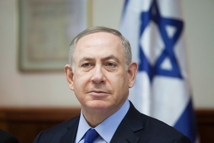 Israeli Prime Minister Benjamin Netanyahu chairs the weekly cabinet meeting in Jerusalem on December 25, 2016. Israel was def