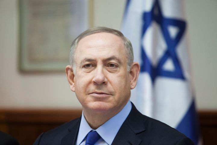 Israeli Prime Minister Benjamin Netanyahu chairs the weekly cabinet meeting in Jerusalem on December 25, 2016. Israel was defiant over a UN vote demanding it halt settlements in Palestinian territory, after lashing out at U.S. President Barack Obama over the 'shameful' resolution. (DAN BALILTY/AFP/Getty Images)