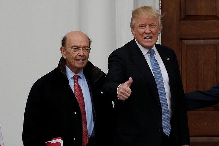 U.S. President-elect Donald Trump and greets Wilbur Ross for their meeting at Trump National Golf Club in Bedminster, New Jersey, in November 