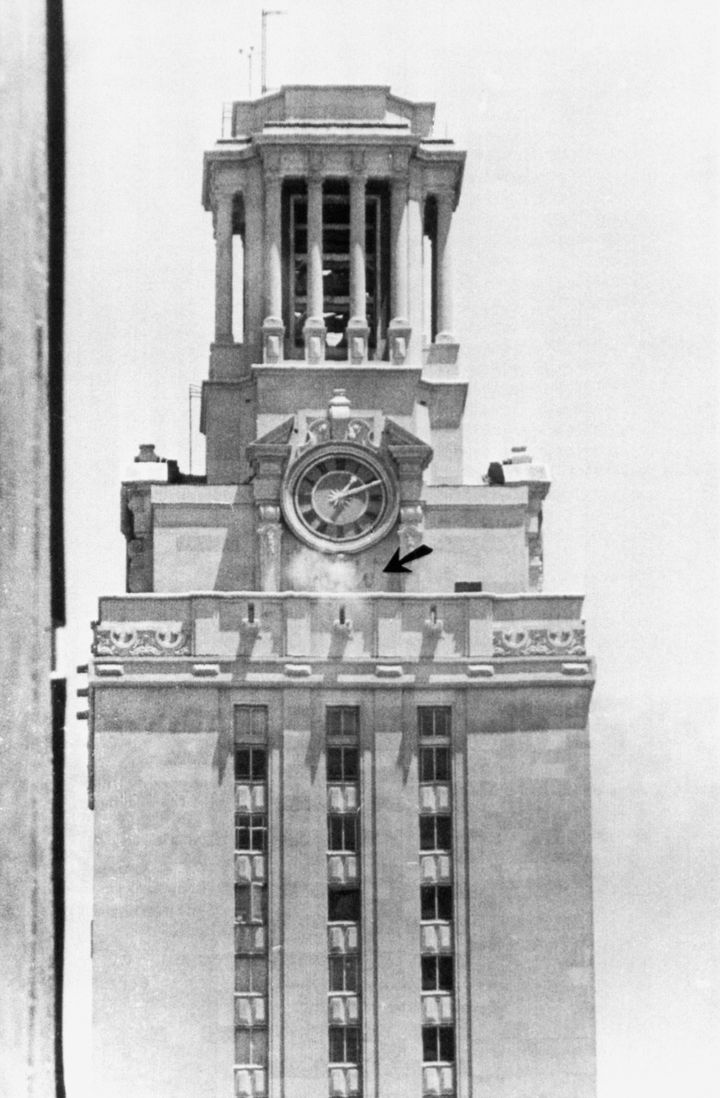Police bullets kick up dust around the clock on the University of Texas tower, as officers return the fire of Charles Whitman, a sniper who terrorized the University campus with weapons fire for 80 minutes August 1st.