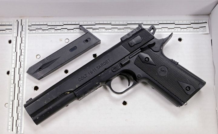 In a Wednesday, Nov. 26, 2014 file photo, a fake handgun taken from 12-year-old Tamir Rice, who was fatally shot by Cleveland police, is displayed after a news conference in Cleveland.