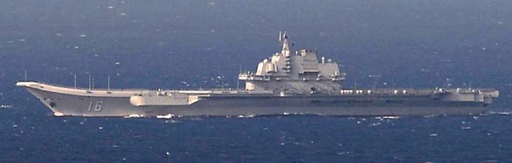 China's Kuznetsov-class aircraft carrier Liaoning sails the water in East China Sea, in this handout photo taken December 25, 2016 by Japan Self-Defence Force.