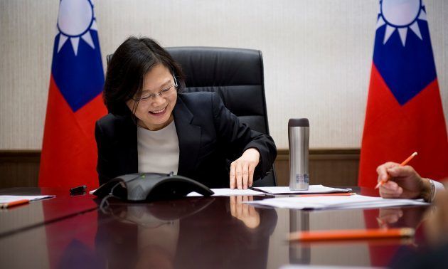 Taiwan's President Tsai Ing-wen speaks on the phone with US President-elect Donald Trump at her office in Taipei, Taiwan