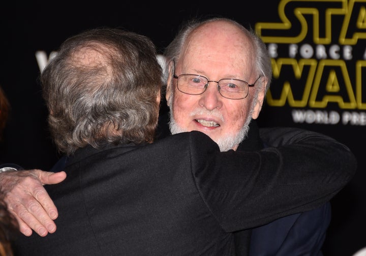 Steven Spielberg (L) hugs composer John Williams as they attend the premiere of Walt Disney Pictures and Lucasfilm's 'Star Wars: The Force Awakens' at the Dolby Theatre on December 14, 2015.