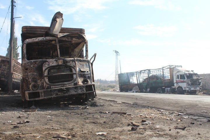 Wreckage of Syrian Red Crescent aid trucks are seen following a Sept. 19 attack killing 12 people in Aleppo.