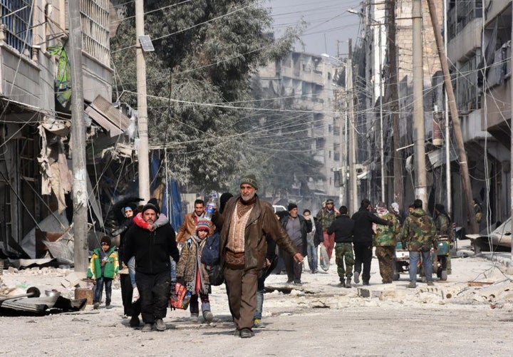 Civilians in Aleppo on Dec. 12.