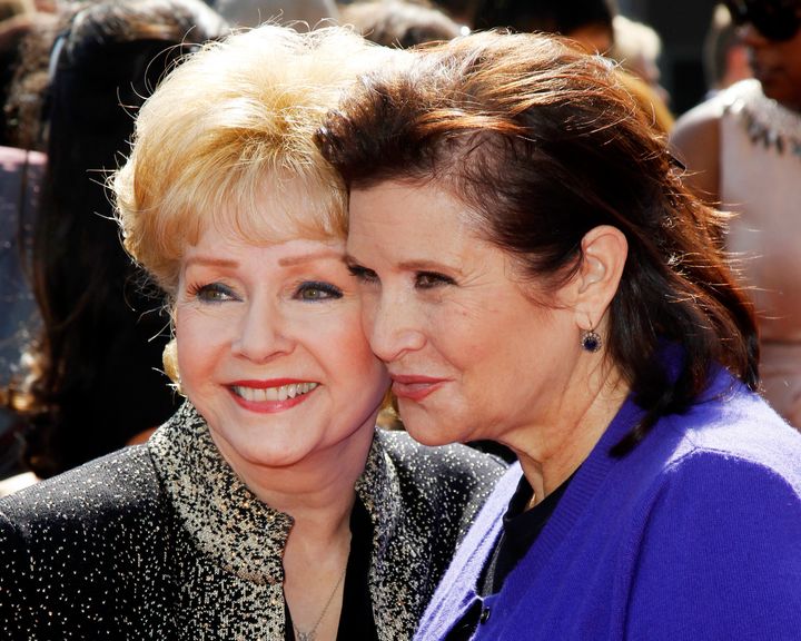 Debbie Reynolds, and her daughter Carrie Fisher, arrive at the 2011 Primetime Creative Arts Emmy Awards in LA, Sept. 10, 2011.