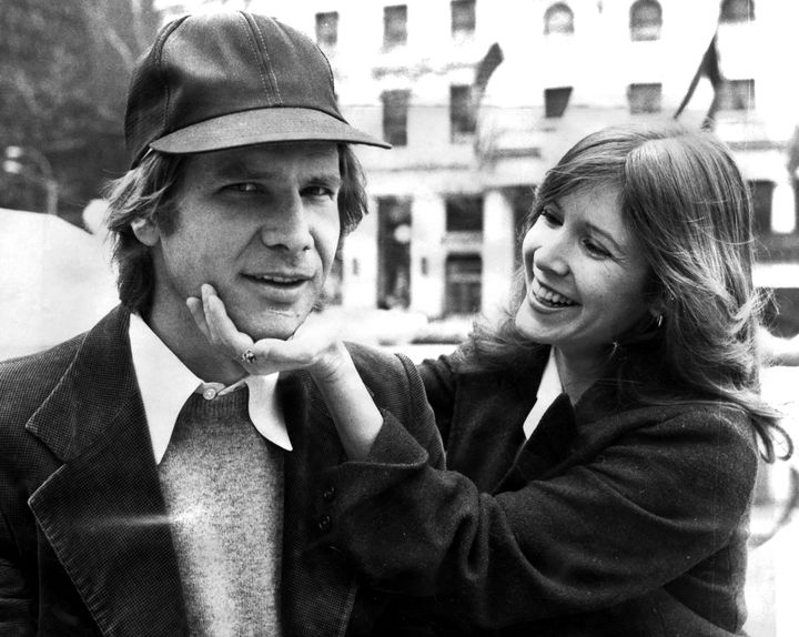 Harrison Ford and Carrie Fisher on Fifth Ave outside The Plaza hotel. They were in town for the movie 'Star Wars.'