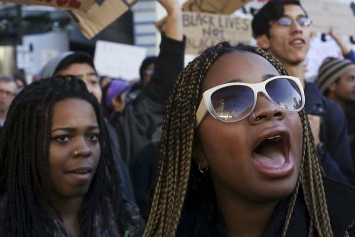 Black Lives Matter protesters shout in Seattle on Nov. 27.