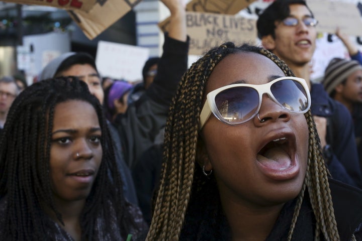 Black Lives Matter protesters shout in Seattle on Nov. 27.