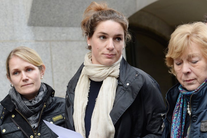 Nadja Ensink (centre) speaks alongside her mother (right) outside the Old Bailey in London