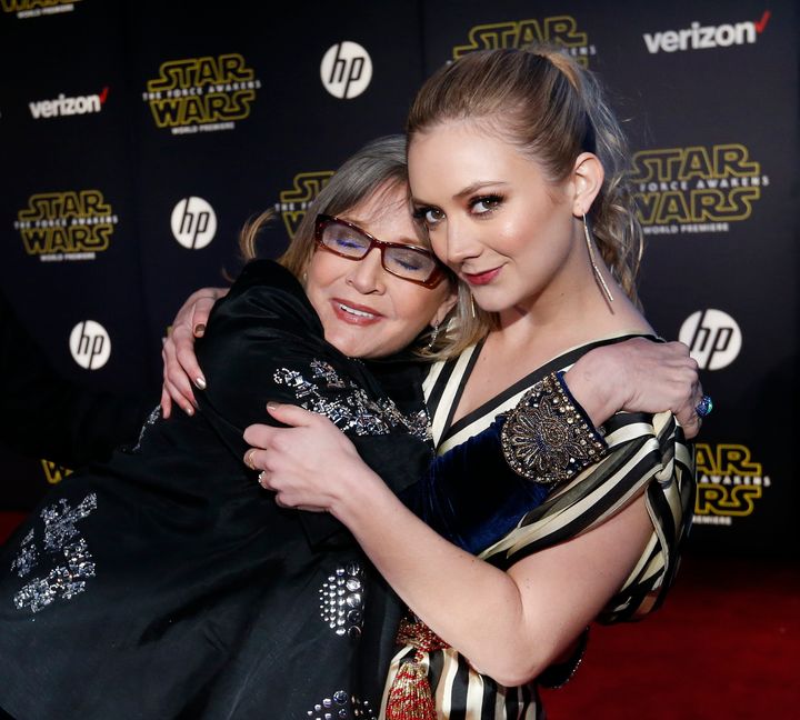 Carrie Fisher and Billie Lourd embrace as they arrive at the premiere of "Star Wars: The Force Awakens" in Hollywood, CA, Dec. 14, 2015.