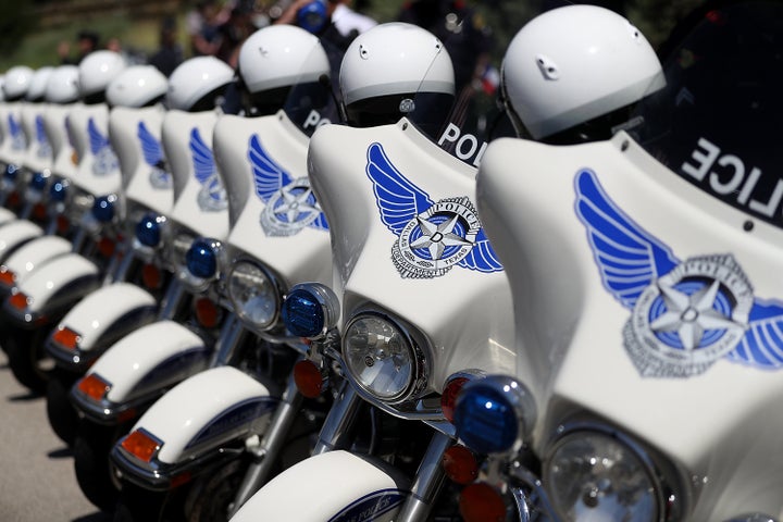 Dallas police motorcycles line up outside the funeral for Sgt. Michael Smith, one of those shot by a gunman in July.