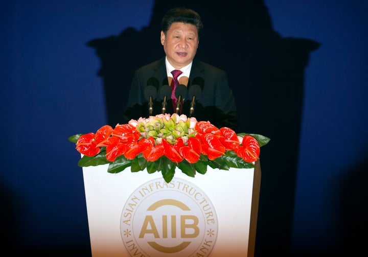 Chinese President Xi Jinping speaks during the opening ceremony of the Asian Infrastructure Investment Bank in Beijing on Jan