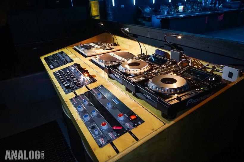 <em>Side-view of DJ booth</em>