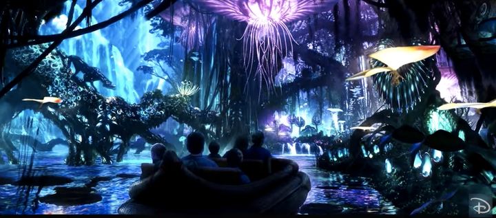 A glimpse of Pandora's river ride through a bioluminescent forest. 