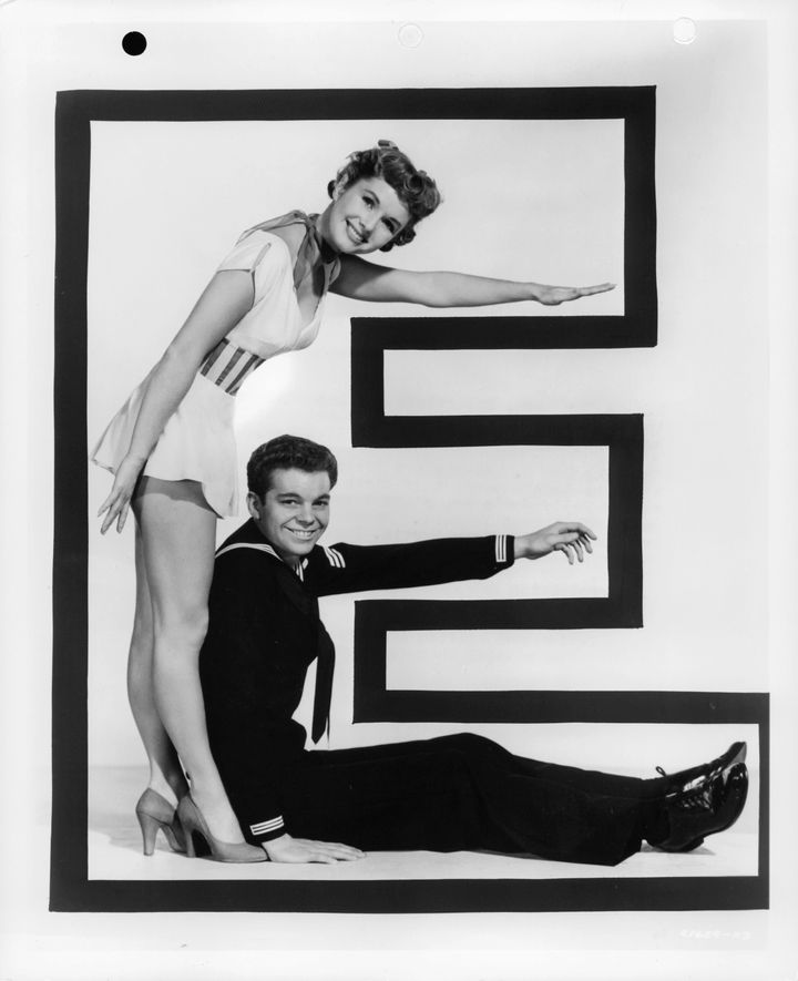 Debbie Reynolds and Russ Tamblyn in a letter "E," from the film "Hit The Deck," 1955.