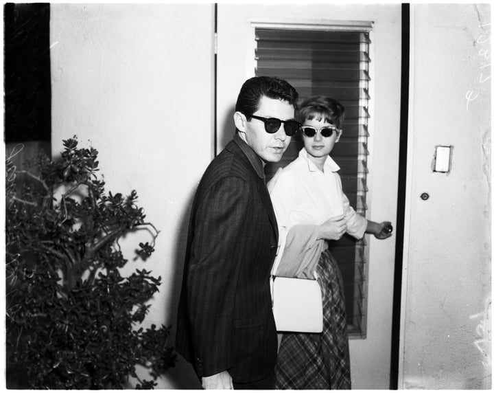 Eddie Fisher and Debbie Reynolds are seen at Elizabeth Taylor's home after Michael Todd's death.