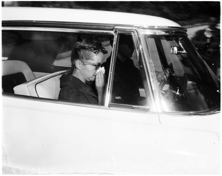 Debbie Reynolds and Eddie Fisher leave Elizabeth Taylor's home after Michael Todd's death.