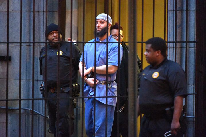 Officials escort Adnan Syed from the courthouse in February 2016. Syed's request to be released on bail was denied Wednesday.