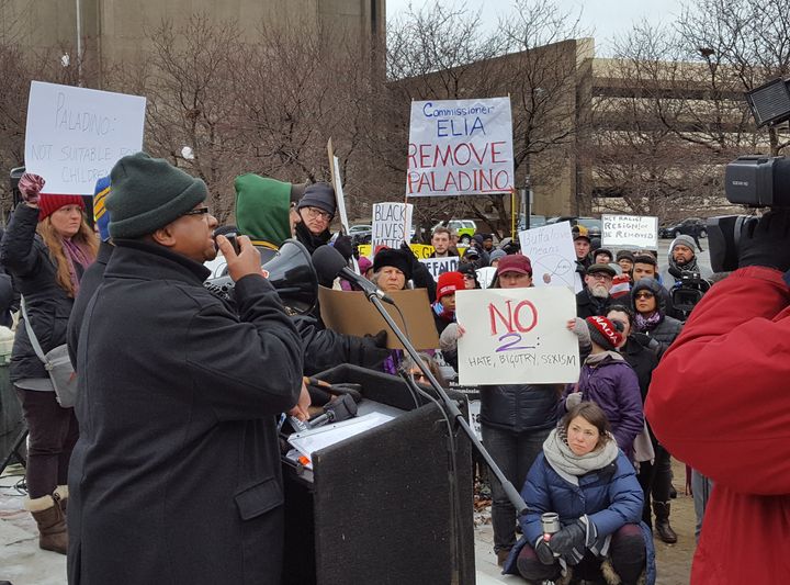 Several hundred people gathered outside city hall Thursday to push for Carl Paladino to be removed from the Buffalo Board of Education.