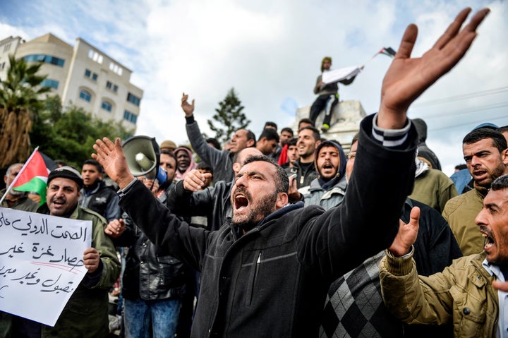 Palestinian workers in Gaza City protest the Israeli blockade of Gaza on Dec. 27, 2016.