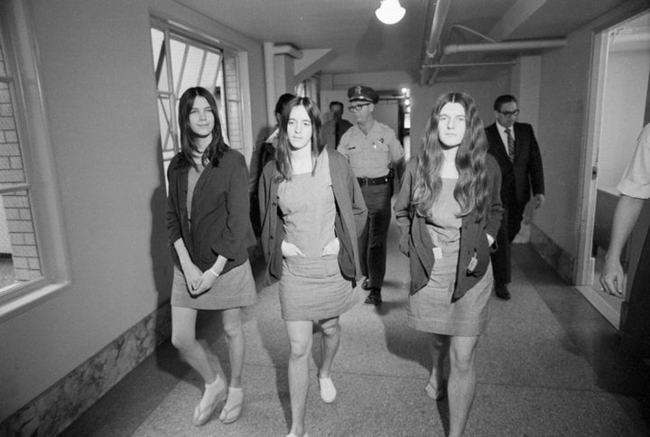 Leslie Van Houten, left, Susan Atkins and Patricia Krenwinkel walk from jail to a Los Angeles courtroom for their 1970 murder trial.